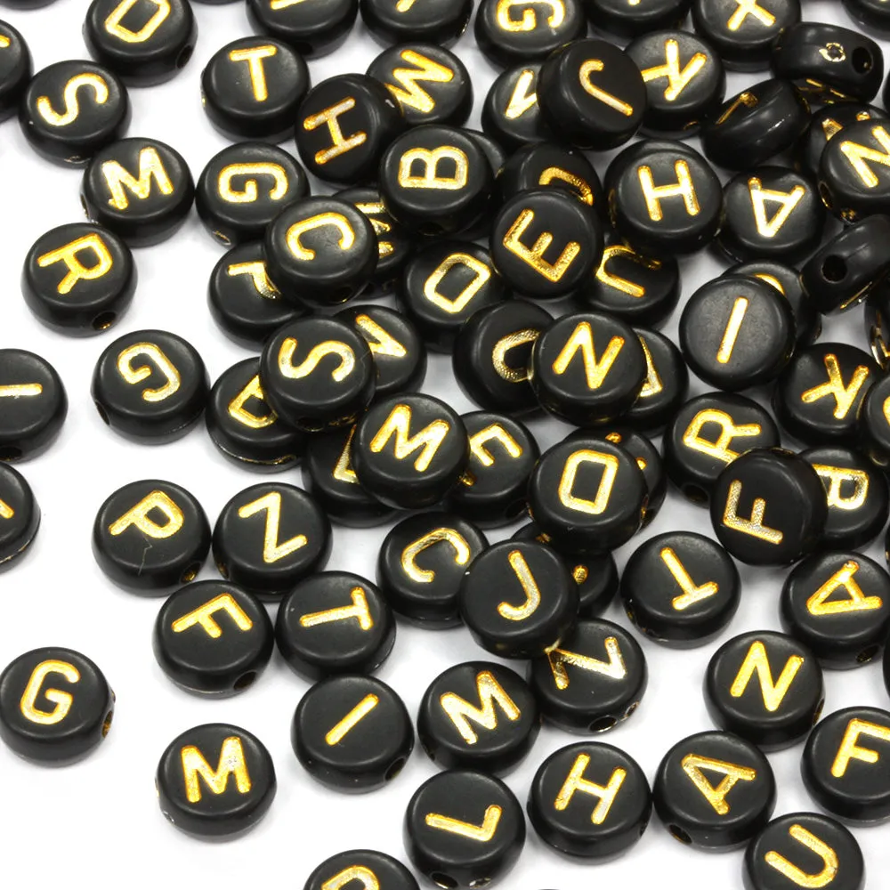 Gold Letters on Black Rounds 4x7mm - Pack of 200